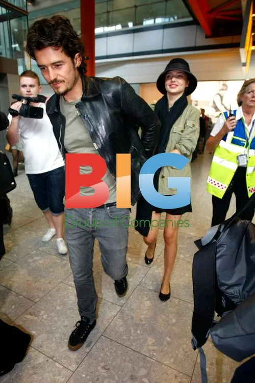 Orlando Bloom and Miranda Kerr at Heathrow