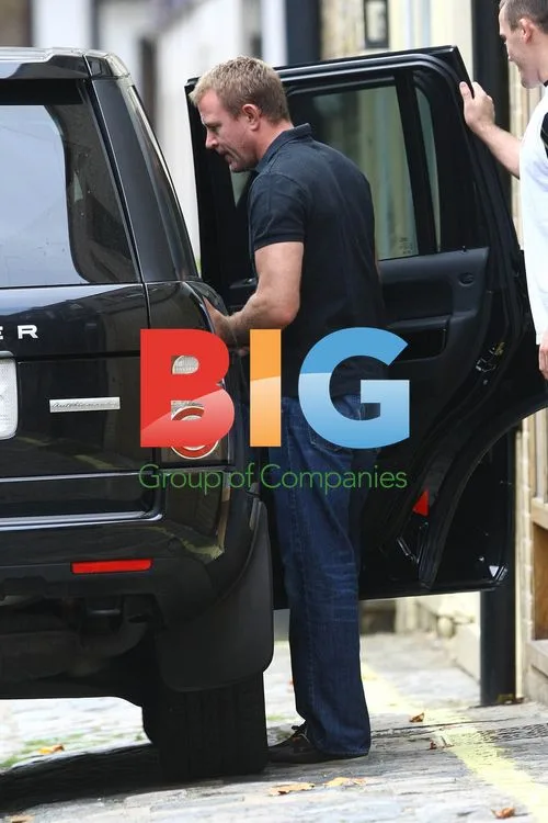 Guy Ritchie's assistant packs his car