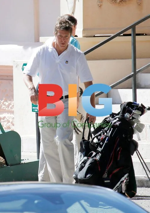 Hugh Grant plays golf and drives Ferrari in Monte-Carlo