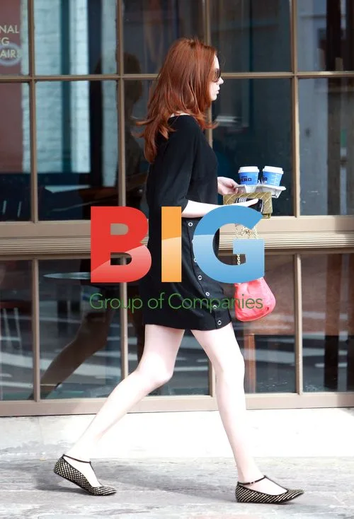 Karen Gillan Battles Windy Weather in London