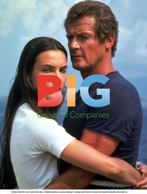 Roger Moore & Carole Bouqet in mid shot