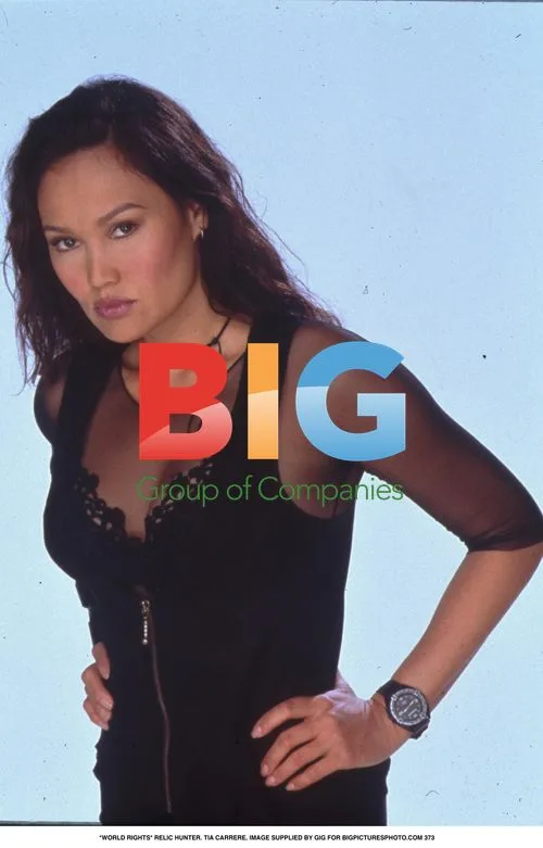 Tia Carrere in Black Dress