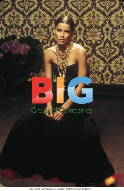 Nelly Furtado in Black Dress
