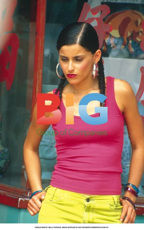 Nelly Furtado in Pink and Yellow