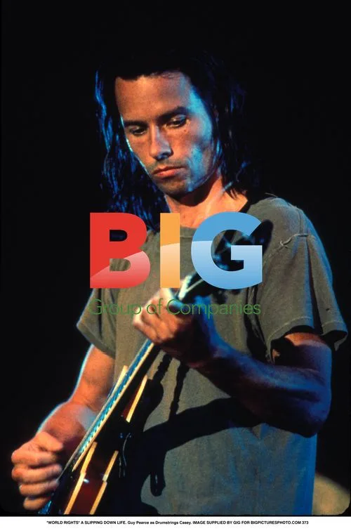 Guy Pearce as Drumstrings Casey