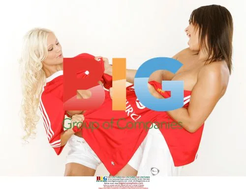 Charlene and Holly Tussle with Rugby Shirts