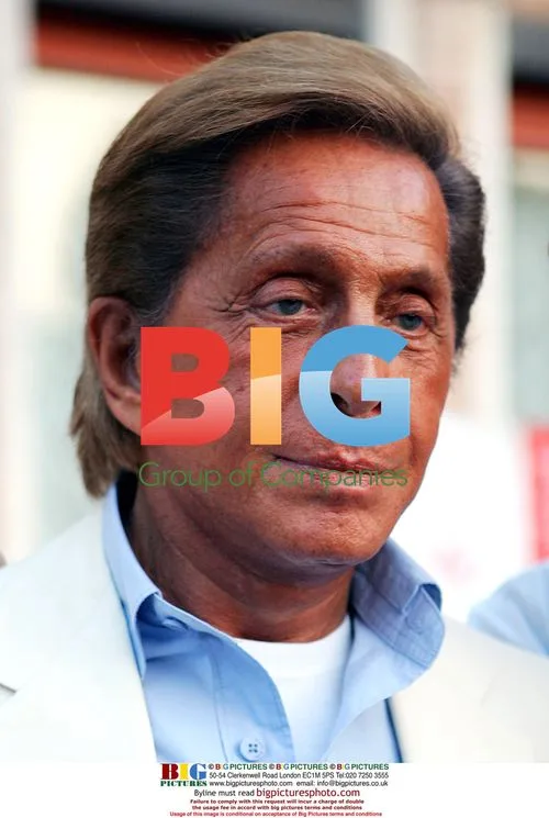 Valentino Leaves Excelsior Hotel for Clooney's Venice Film Premiere