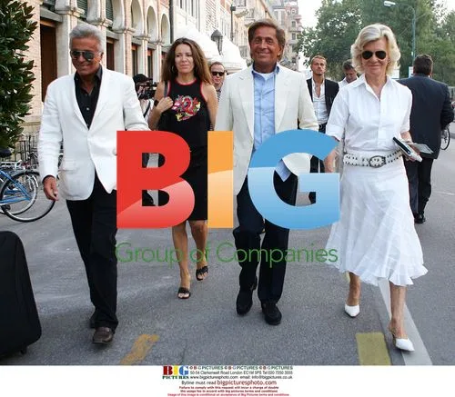 Valentino leaves Venice hotel for Clooney film premiere