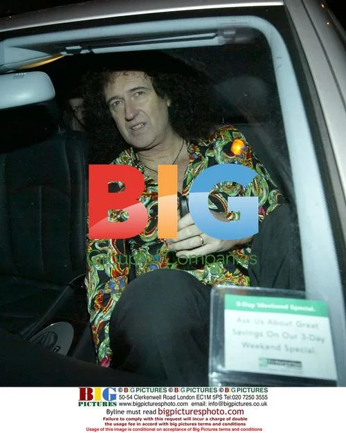 Queen's Brian May leaves London nightclub