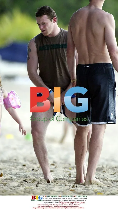 Wayne Rooney and Coleen McLoughlin on holiday