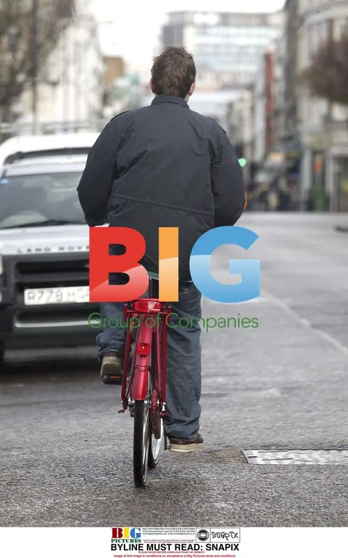 Damon Albarn Shopping on Push-Bike