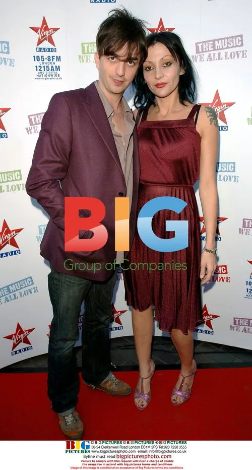 Supergrass drummer Danny Goffey and Pearl Lowe at Virgin Radio party