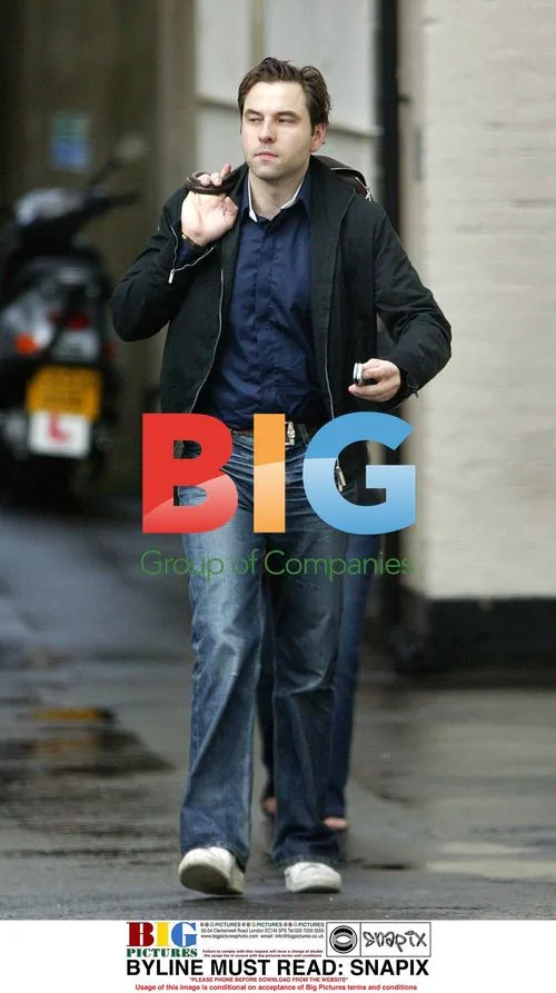 David Walliams using cash machine in London