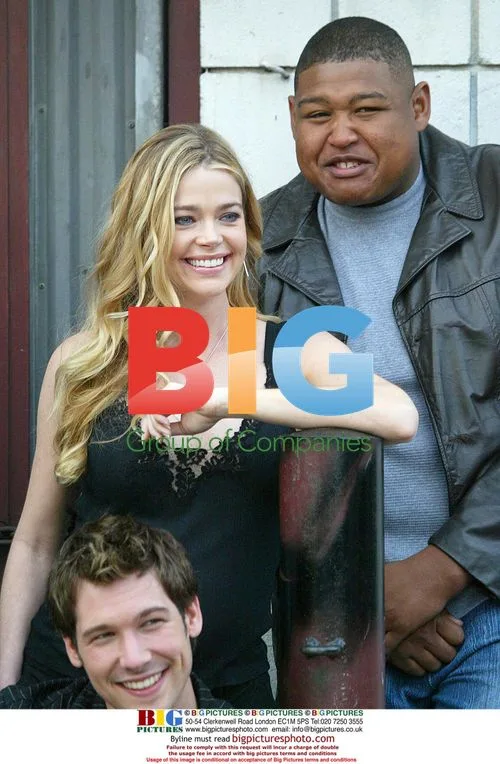 Denise Richards Gets Cozy with Mystery Man