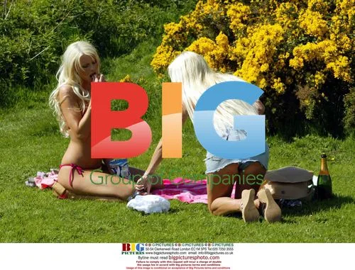Model Emma B in the park with friend