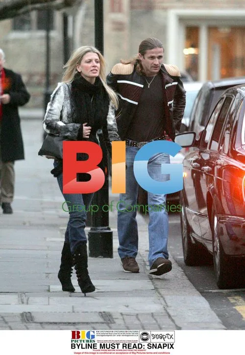 Emmanuel Petit and Girlfriend in Bentley
