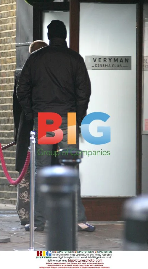 Arsenal players Ljungberg and Shaaban leaving cinema