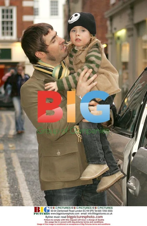 Liam Gallagher with son Gene in Soho