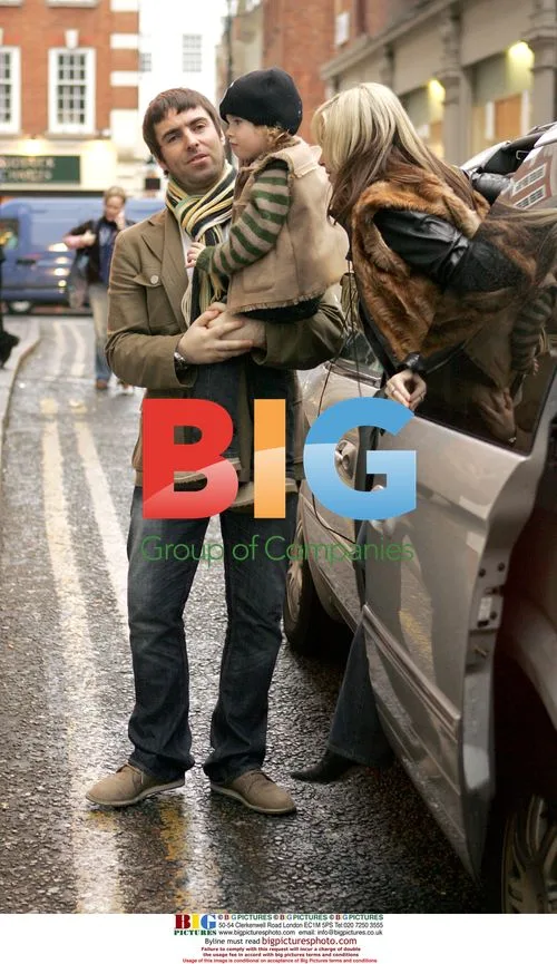 Liam Gallagher with son and partner in London