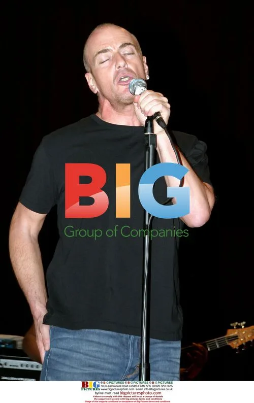 Peter Cox of Go West on stage in Manchester