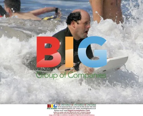 Jason Alexander Boogie-Boards in Hawaii