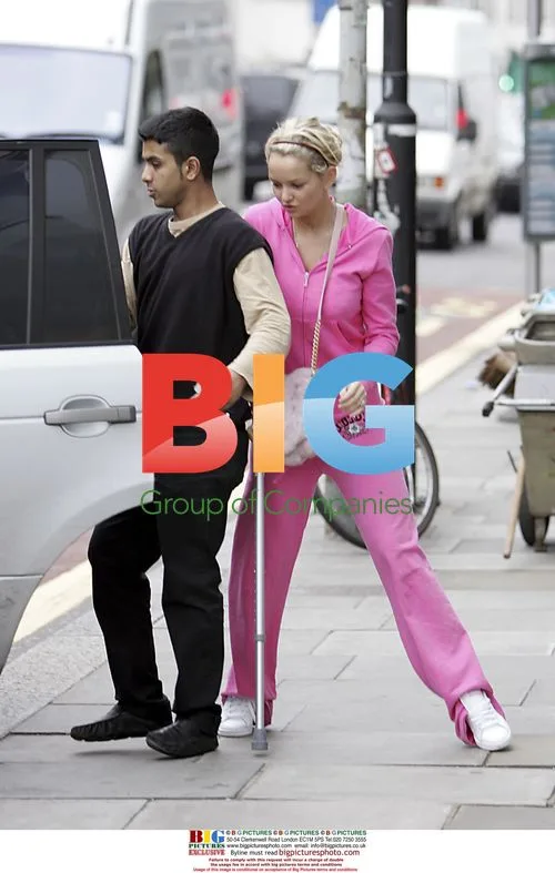Jennifer Ellison Assisted with Bags