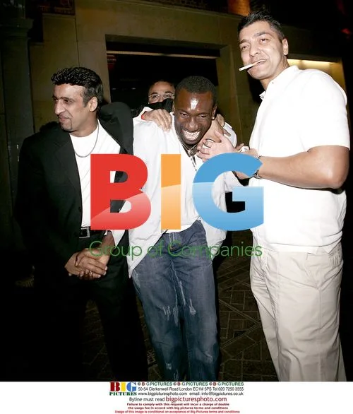 Footballer Jimmy Floyd Hasselbaink out with friends