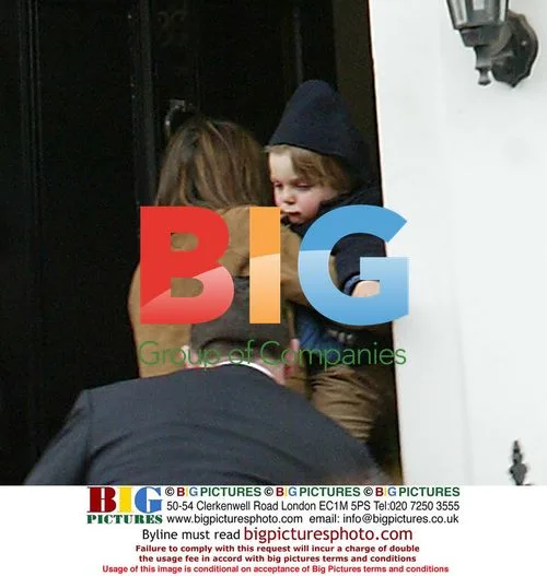 Liz Hurley, Damien, and Arun Nayar arrive home