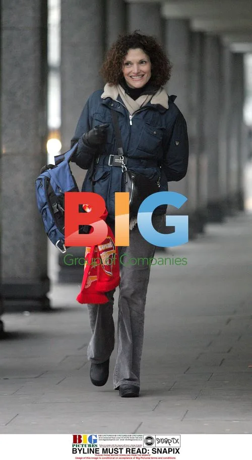 Mary Elisabeth Mastrantonio picks up son from school in London