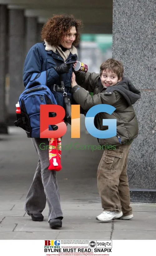 Actress Mary Elisabeth Mastrantonio with son