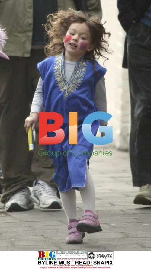 Missy, Damon Albarn's daughter, face painted dancing
