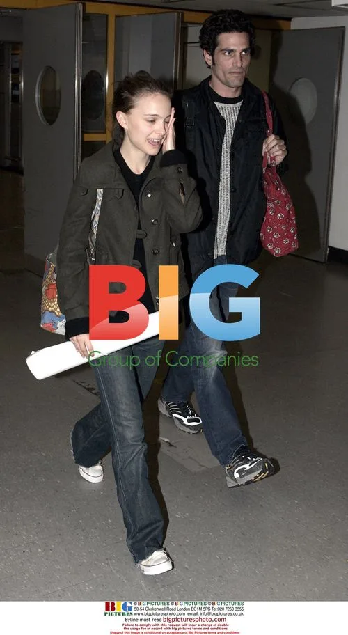 Natalie Portman departs Heathrow for Oscars