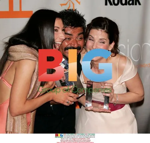 Gesine Prado, George Lopez, and Sandra Bullock at 2005 Crystal and Lucy Awards