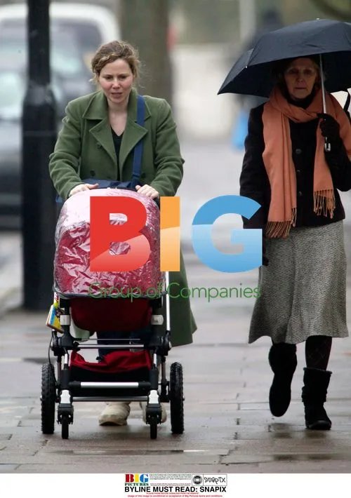 Sally Phillips with mother and baby