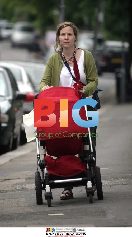 Sally Philips with baby in north London
