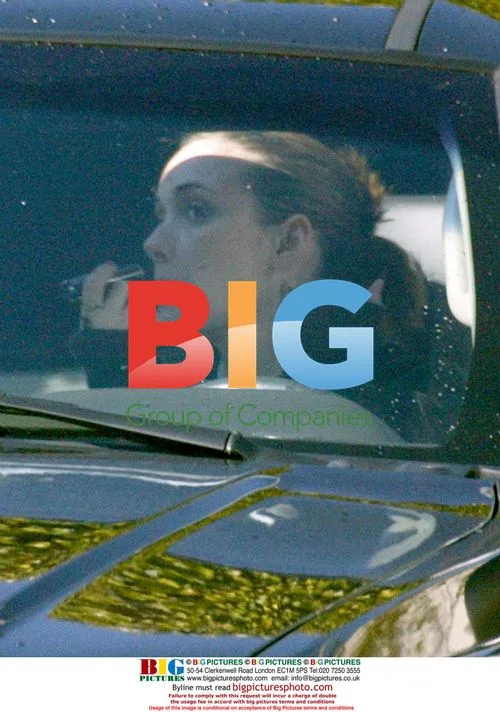 Winona Ryder Driving and Applying Makeup